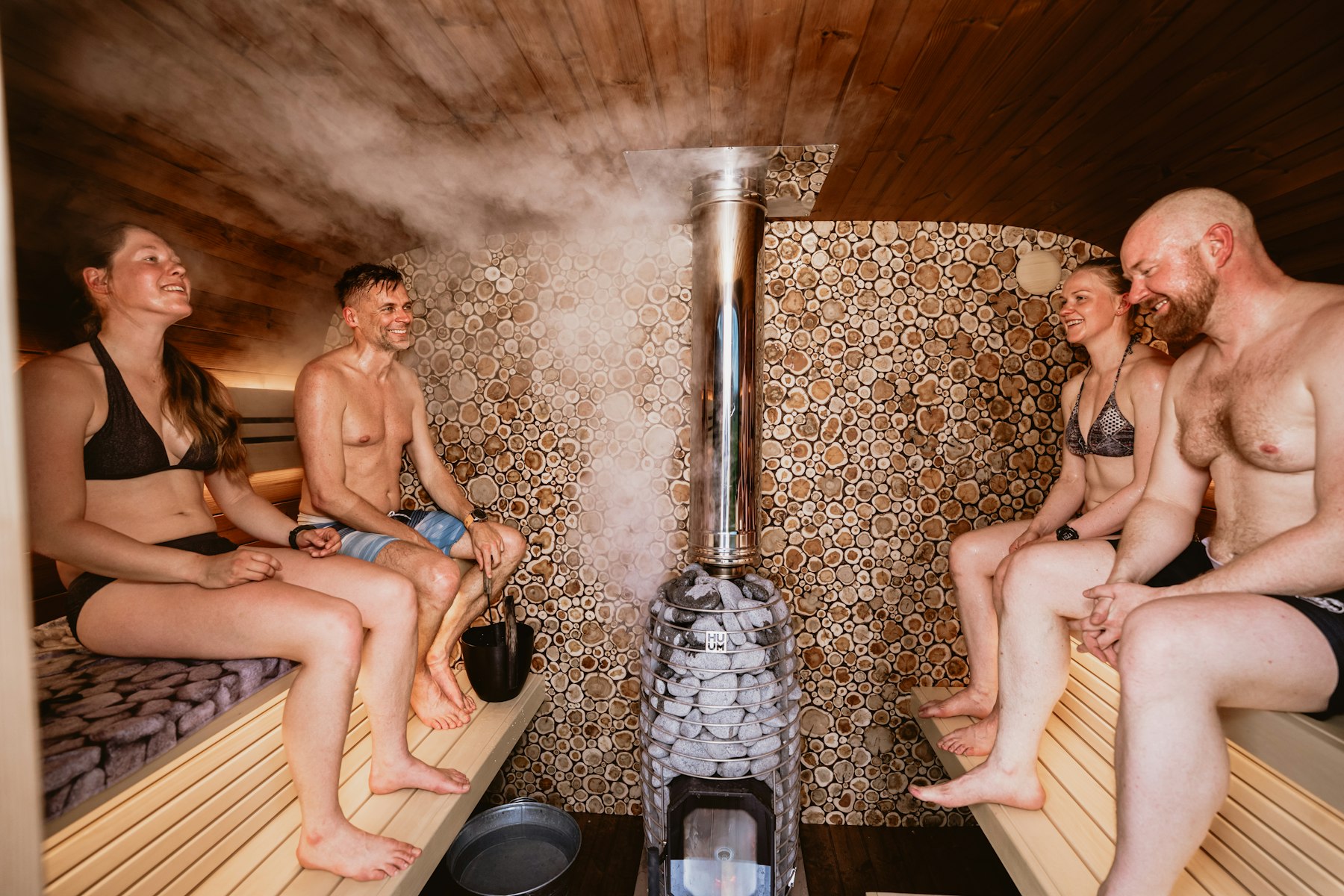 Friends sharing a sauna session